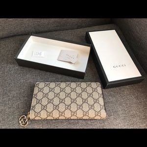 Gucci Logo Zip Around Wallet
